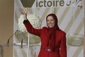 Maryam Rajavi, who heads the Paris-based National Council of Resistance of Iran (NCRI), waves to supporters of exiled Iranians in Auvers-sur-Oise
