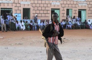 Fighter from the moderate Ahlu Sunna forces stands on guard, as security is tightened during a public gathering in the area of Dhusamareeb in central Somalia
