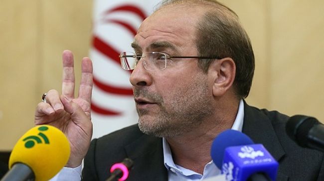 Iranian presidential candidate Mohammad Baqer Qalibaf addresses a group of lawmakers in Tehran on May 28, 2013.