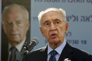 Israeli President Shimon Peres gives a speech during a ceremony for late Israeli prime minister Yitzhak Rabin at the Mount Herzl cemetery in Jerusalem