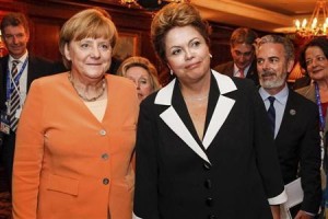 Brazil's President Rousseff and German Chancellor Merkel pose during a meeting at Santiago