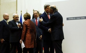Iranian Foreign Minister Zarif talks with European Union foreign policy chief Ashton after a ceremony at the United Nations in Geneva