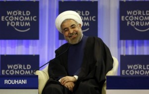 Iran's President Rouhani smiles during session of World Economic Forum in Davos
