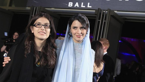 Sarina daughter of director of Iranian film "A Separation," Asghar Farhadi, smiles with actress Hatami during the Governors Ball following the 84th Academy Awards in Hollywood