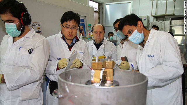 IAEA inspectors and Iranian technicians at the Natanz facility