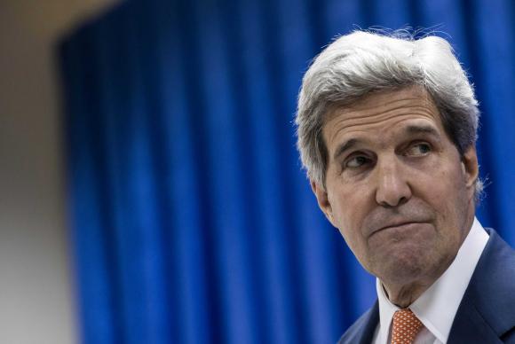 U.S. Secretary of State John Kerry pauses as he speaks during a news conference at the U.S. embassy in the International Zone in Baghdad