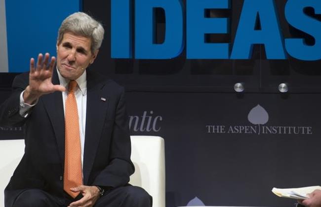 Secretary of State John Kerry gestures while participating in the Sixth Annual Washington Ideas Forum in Washington, Thursday, Oct. 30, 2014. (AP Photo/Cliff Owen