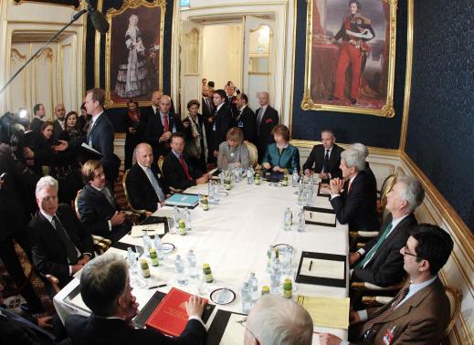 French Foreign Minister Fabius, EU envoy Ashton, U.S. Secretary of State Kerry and Britain's Foreign Secretary Hammond sit a a table during talks in Vienna