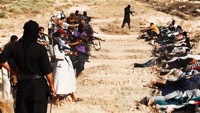 The file photo shows ISIL terrorists executing a group of people in Iraq.