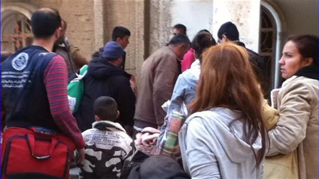 This file photo shows Assyrian Christians in Syrias northeastern city of Hasakah.