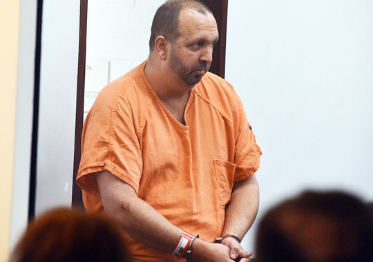 Craig Stephen Hicks, 46, was charged for allegedly killing three young Muslim neighbors in what police say points to a dispute over parking. The victims family however still demands an investigation into what they say could be a possible hate crime. (Reuters)