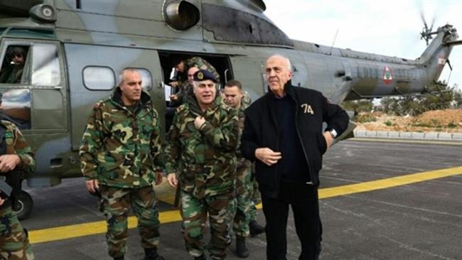 Lebanons Defense Minister Samir Moqbel (R) and Army chief Gen. Jean Kahwagi (C) arrive in Ras Baalbek to inspect troops guarding against terrorist intrusion at Syria border, Feb. 27, 2015.