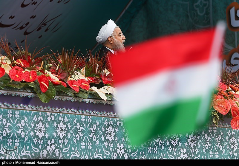 Iran's President Rouhani addresses rally on the 36th anniversary of Islamic Revolution.