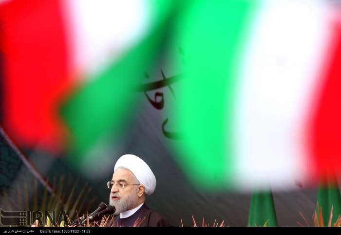 Iran's President Rouhani addresses rally on the 36th anniversary of Islamic Revolution.