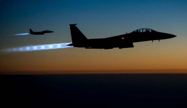 Archive: A pair of U.S. F-15E Strike Eagle fly over northern Iraq, after conducting airstrikes in Syria. Photo by AP