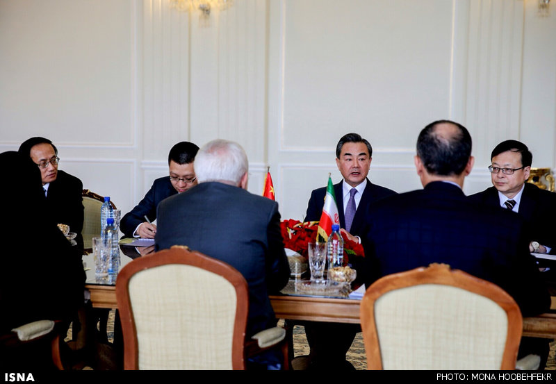 Chinese Foreign Minister Wang Yi meets his Iranian counterpart Zarif in Tehran on February 15, 2015.