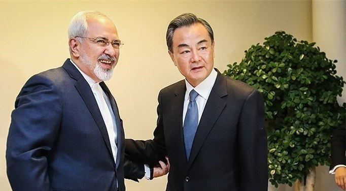 Chinese Foreign Minister Wang Yi meets his Iranian counterpart Zarif in Tehran on February 15, 2015.
