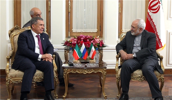 Iran's FM Mohammad Javad Zarif meets Tatarstan's President Rostam Minnikhanov in Tehran on March 10, 2015.