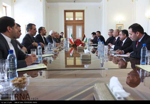 Iranian Foreign Minister Mohammad Javad Zarif meets Jordanian counterpart Nasser Judeh in the Iranian capital, Tehran, on March 7, 2015.