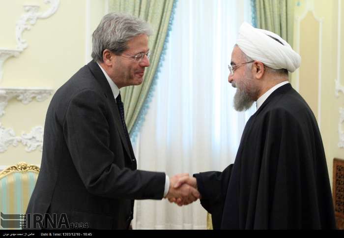 Irans President Hassan Rouhani and Italys Foreign Minister Paolo Gentiloni meet in Tehran on March 1, 2015.
