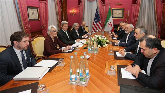 Iranian nuclear negotiators, headed by Foreign Minister Mohammad Javad Zarif, (3rd R) meet the US delegates, headed by Secretary of State John Kerry (3rd L) in the Swiss city of Lusanne, March 17, 2015.