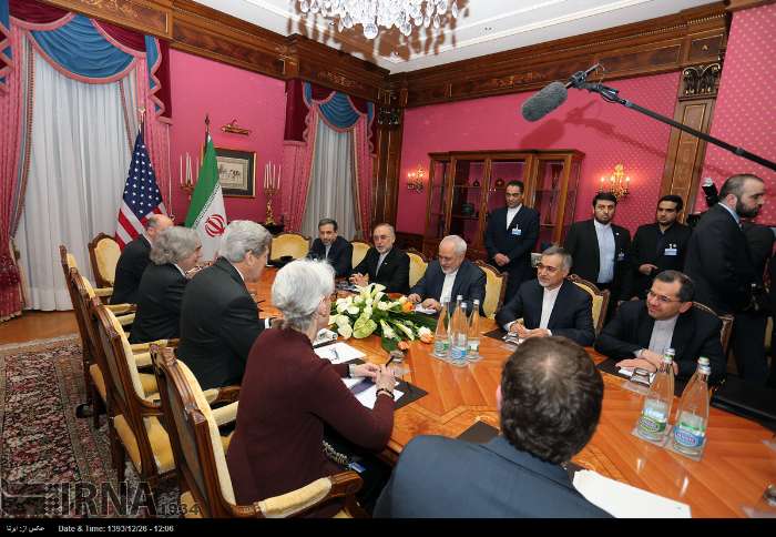 Iranian nuclear negotiators, headed by Foreign Minister Mohammad Javad Zarif, (3rd R) meet the US delegates, headed by Secretary of State John Kerry (3rd L) in the Swiss city of Lusanne, March 17, 2015.