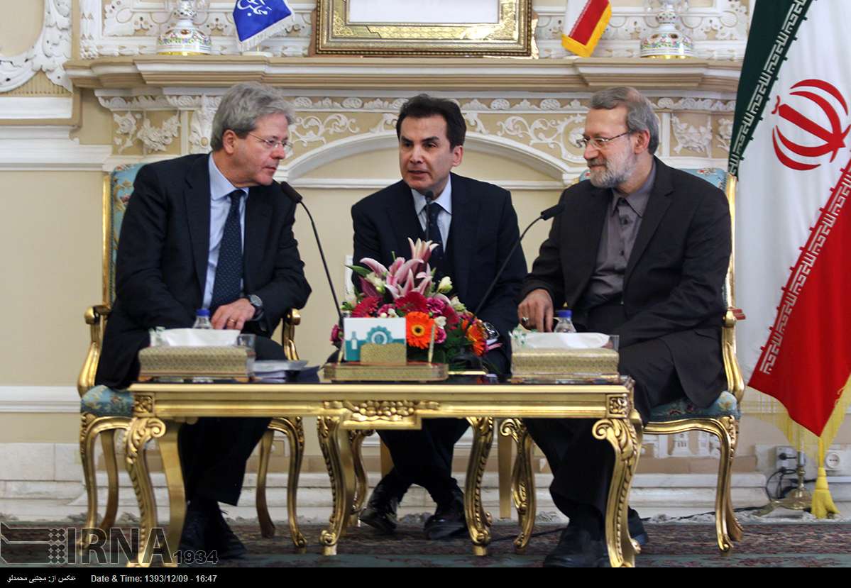 Iranian Parliament Speaker Ali Larijani meets Italian Foreign Minister Paolo Gentiloni in Tehran on February 28, 2015.