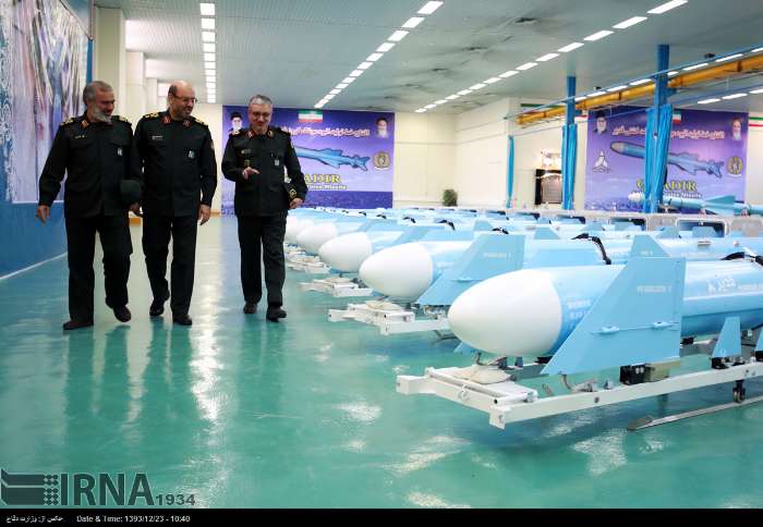 Iran's Defense Minister Brigadier General Hossein Dehghan inaugurates mass production line of long-range anti-ship cruise missiles in Tehran on March 14, 2015.