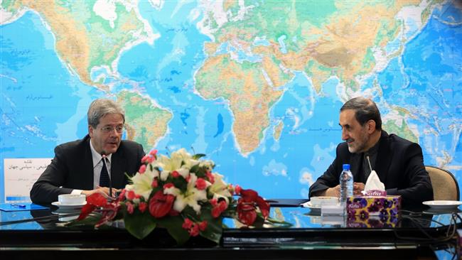 Senior Iranian official Ali Akbar Velayati (R) and Italys Foreign Minister Paolo Gentiloni meet in Tehran on March 1, 2015.